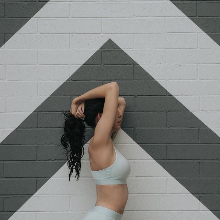 Interior of a professional gym with weight training equipment and mirrors